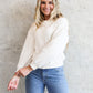 OVERSIZED RIBBED SWEATER IN CREAM